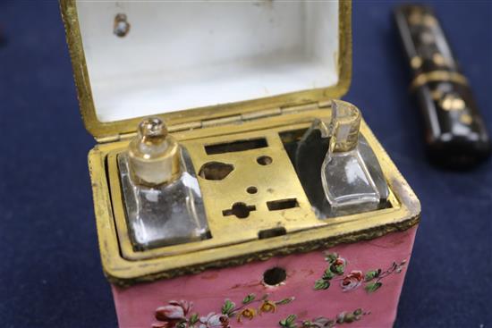 Two tortoiseshell etuis, a tortoiseshell case, a 19th century walnut snuff box and and enamel porcelain etui